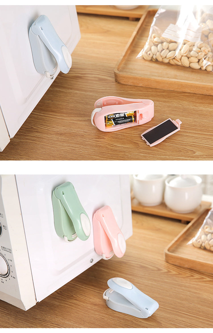 Mini hand pressure electric snack sealing machine